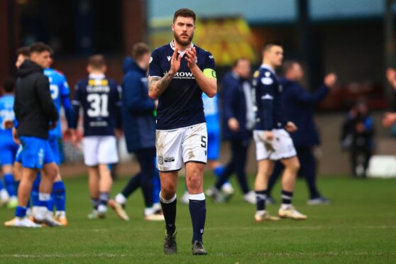 Dundee skipper Ryan Sweeney applauds fans after frustrating Inverness draw. Image: David Young/Shutterstock.