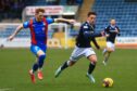 Dundee's Luke Hannant takes on David Carson of Inverness. Image: David Young/Shutterstock.