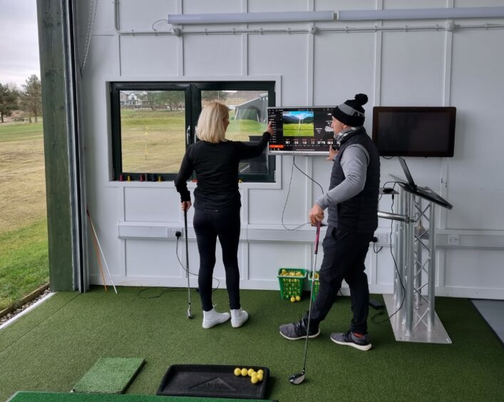 A photo of a golf lesson at Drumoig