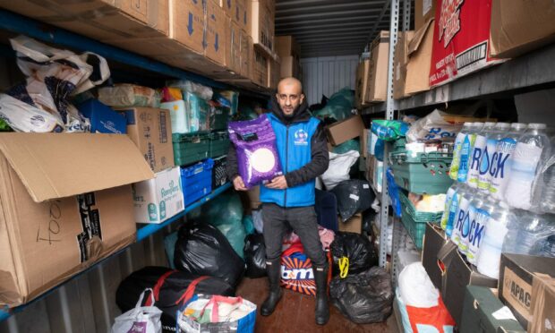 A1 Car Wash's Imran Amin, known as Manny, with some of the donations. Image: Paul Reid