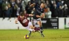 Tom Lang in action versus Linlithgow. Image: SNS.