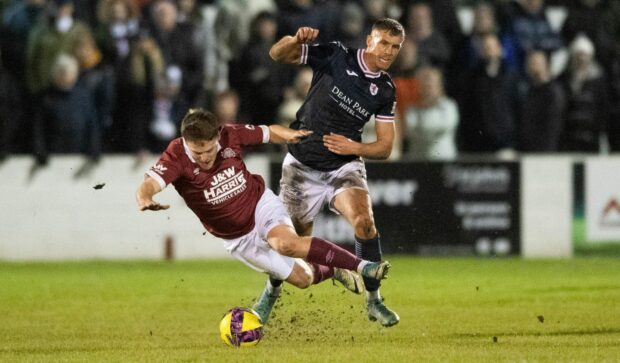 Tom Lang in action versus Linlithgow. Image: SNS.