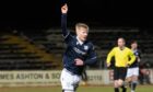 Lyall Cameron celebrates after putting Dundee ahead against Raith Rovers. Image: SNS.