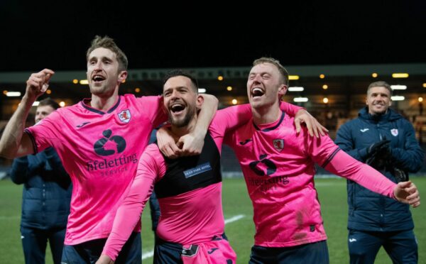 Raith Rovers' Dylan Easton (centre) celebrates with Ryan Nolan (left) and Ross Millen after their semi-final win over Dundee. Image: SNS.