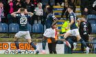 Rovers celebrate Isma Goncalves' goal to make it 3-1 versus Motherwell. Image: SNS.