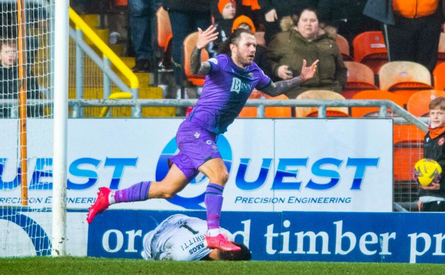 Stevie May bolts away from a stricken Birighitti