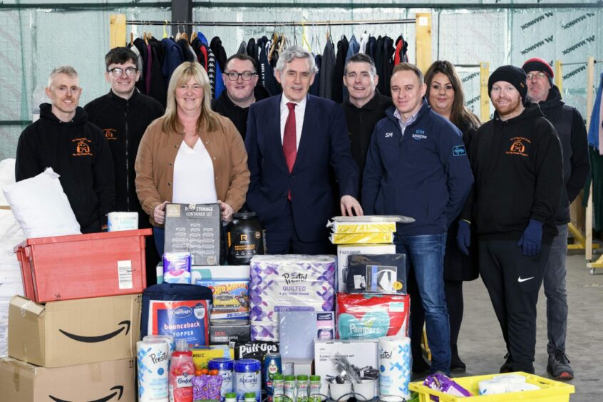 Volunteers with Big Hoose Project donations