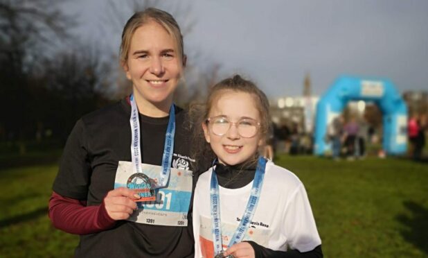 Ashleigh Rattray and daughter Maizie celebrate completing a landmark run in Glasgow. Image: Ashleigh Rattray.