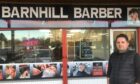 Barnhill Barber owner Sangar Karim outside his shop at Campfield Square.