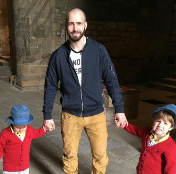 Barry Martin, 37, with his sons Oliver and Daniel. Image: SFRS