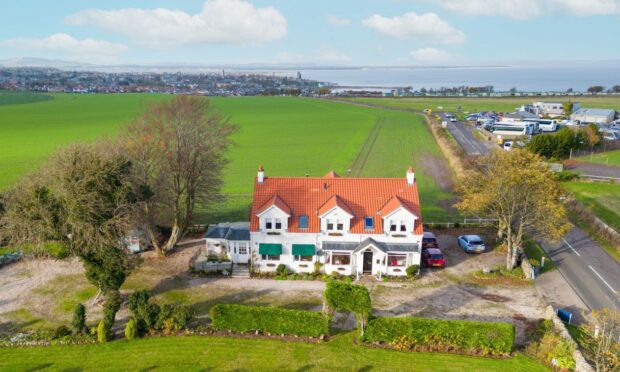 Birchwood Cottage has spectacular views and is within walking distance of St Andrews. Image: Lawrie Estate Agents.