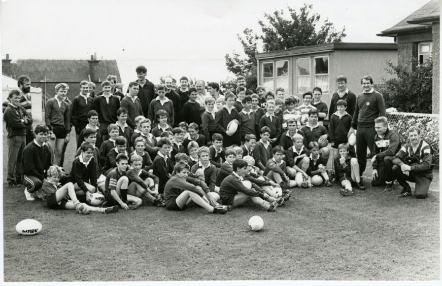 Scotland international players David Leslie and Ray Laidlaw coaching youngsters at Harris Academy in September 1988.