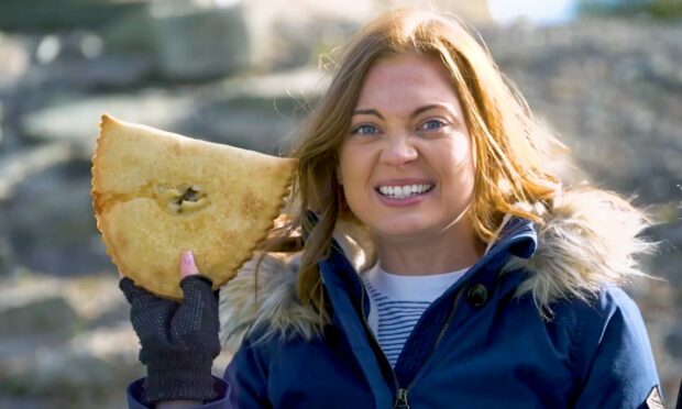Natalie Erskine got her hands on a Forfar bridie in tonight's episode of Eat The Town. Image: BBC Scotland