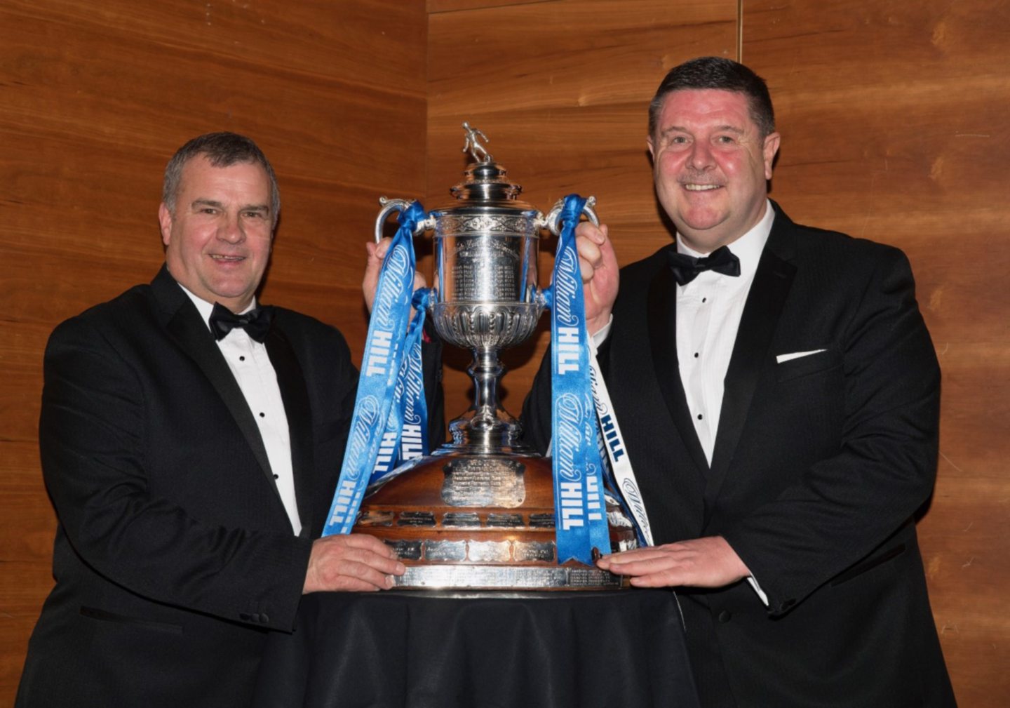 George Browning, right, and Alistair Stevenson hold up Scottish Cup after St Johnstone's victory in 2021.