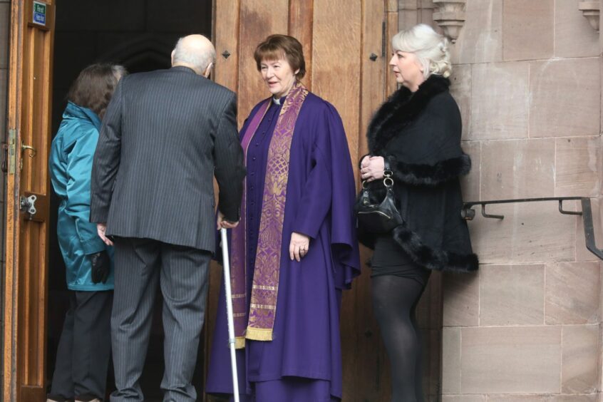 Rev Karen Fenwick and Rosemary Yule greet people arriving at the memorial service for Dr Yule in Forfar.