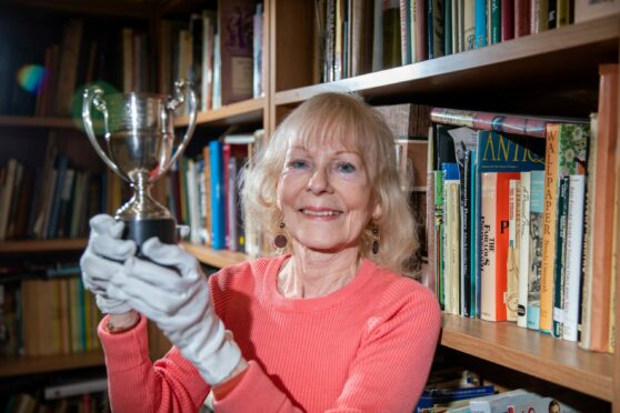 Wilma Lambie (Coutts) got back together with the trophy after 60 years. Image: Kim Cessford/DC Thomson.