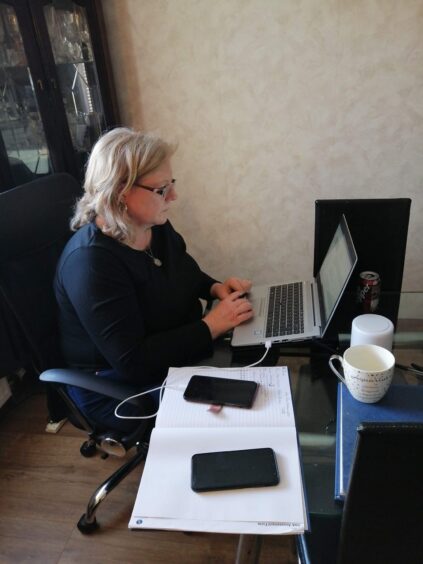 Gillian Batchelor at her desk.