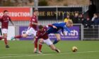 Arbroath's Tam O'Brien challenging Miko Virtanen in the Cove Rangers v Arbroath game. Image: Darrell Benns / DCT Media