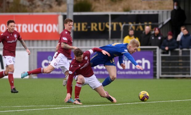 Arbroath's Tam O'Brien challenging Miko Virtanen in the Cove Rangers v Arbroath game. Image: Darrell Benns / DCT Media