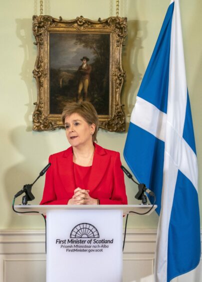 Nicola Sturgeon at the lectern in Bute House