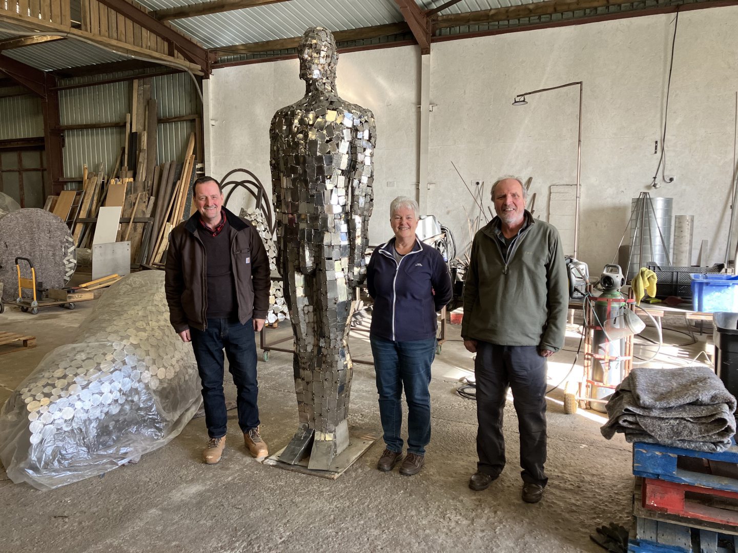 Environmental artist Rob Mulholland with Mirror Man.