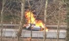 Car fire on the M90 near Kelty. Image: Fife Jammer Locations/Facebook