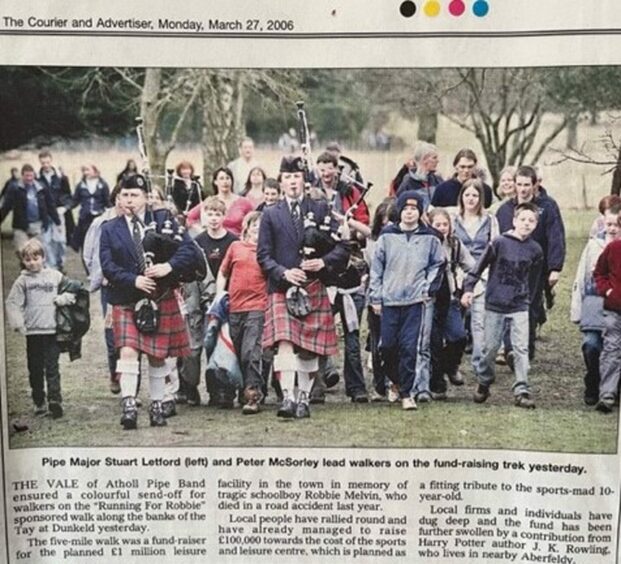 Courier coverage of the sponsored walk in Robbie's memory. 