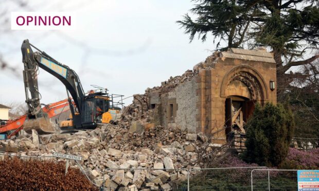 Bulldozer and rubble outside the remains of Craigiebank Church in Dundee.