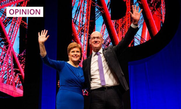 Nicola Sturgeon and John Swinney on stage at the SNP conference in Aberdeen in 2022.