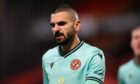 Dundee United star Aziz Behich is determined to successfully beat relegation for the fourth time. Image: SNS