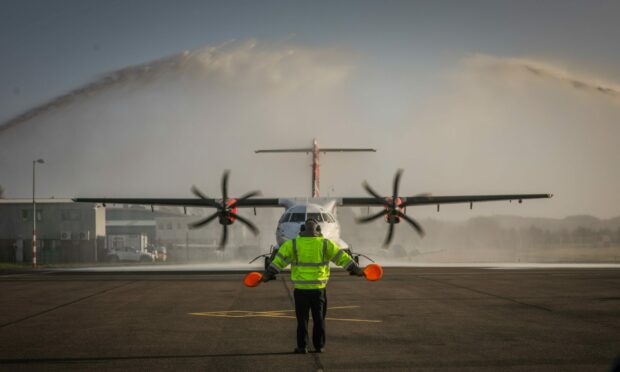 A flight landing at Dundee Airport. Image: Mhairi Edwards/DC Thomson.
