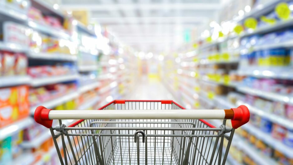 shopping trolley in a supermarket aisle.