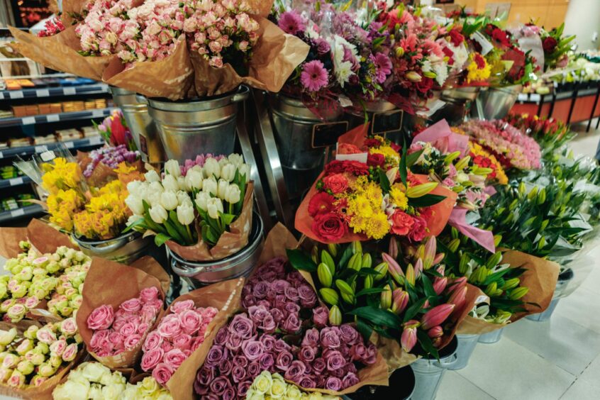 supermarket display of flowers.