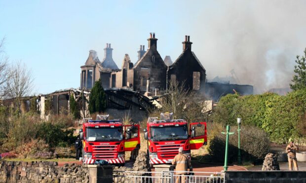 The burnt-out Gartwhinzean Hotel in Powmill following the fire in 2012. Image: DC Thomson