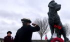 HMS Montrose CO Commander Claire Thompson and Angus Lord Lieutenant Pat Sawers led a tribute to Second World War sea dog Bamse. Image: Royal Navy.