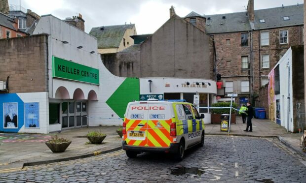 Police at the back of the Keillor Centre in Dundee. Image: DC Thomson