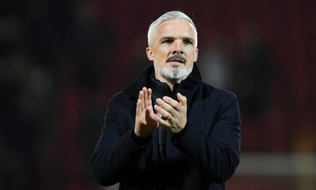 Jim Goodwin applauds Dundee United supporters