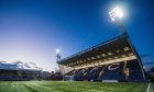 A picture of Raith Rovers' Stark's Park stadium under the floodlights.