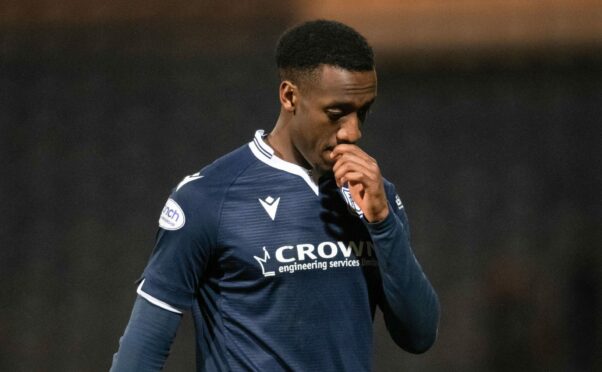 A dejected Zach Robinson trudges off after the Partick Thistle loss. Image: SNS.