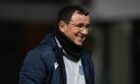 Dundee manager Gary Bowyer grimaces after his side were beaten by Partick Thistle at Dens Park. Image: SNS.