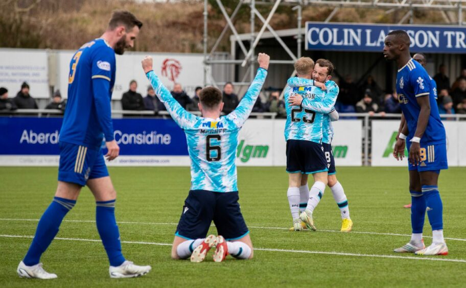 Dundee celebrate Lyall Cameron's opening goal at Cove. 