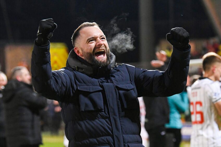 Pars manager James McPake celebrates a victory over Falkirk.