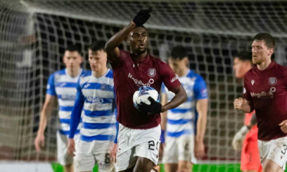 Sean Adarkwa celebrates his Arbroath equaliser against Morton. 