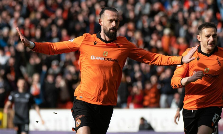 Steven Fletcher celebrates scoring a goal for Dundee United at Tannadice 