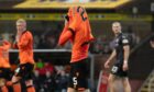 Dundee United's Kai Fotheringham is dejected after missing a chance as his side were held by St Mirren. Image: SNS.