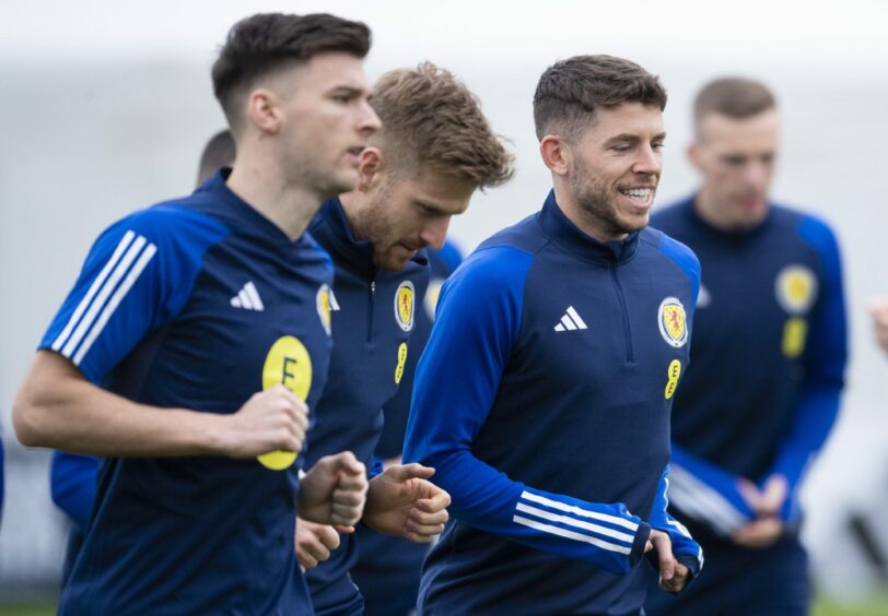 Scotland players Ryan Christie, Stuart Armstrong and Kieran Tierney in training.