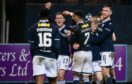 Dundee celebrate Luke McCowan's goal after he made it 3-1 against Ayr. Image: SNS.
