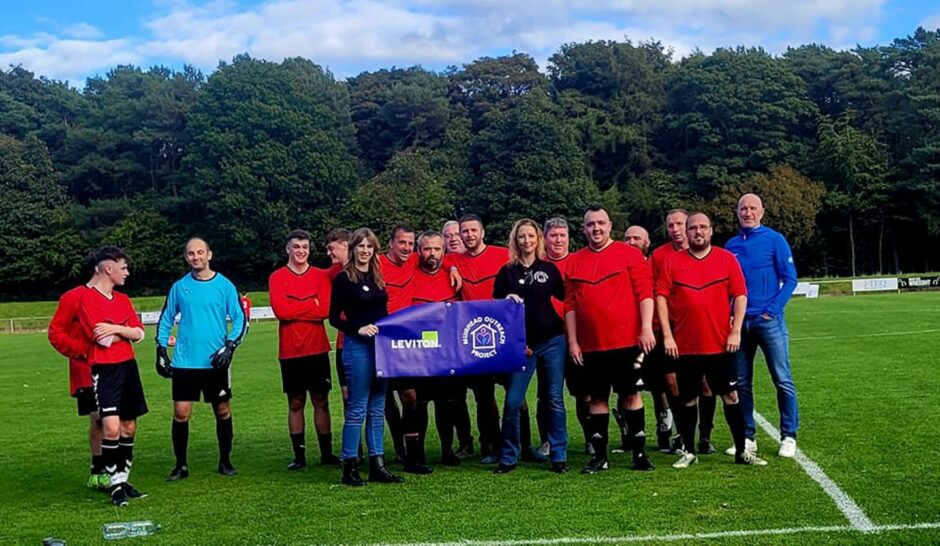 Leviton football tournament team with charity partner Muirhead Outreach Project.