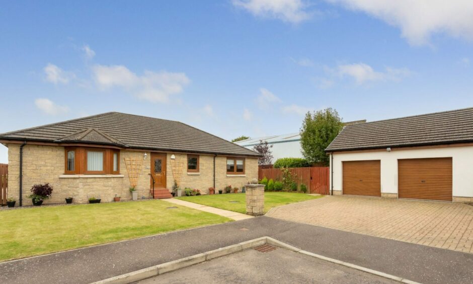 This detached bungalow is on a quiet street in Dundee.