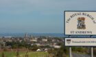 Name sign with town of St Andrews in the background.